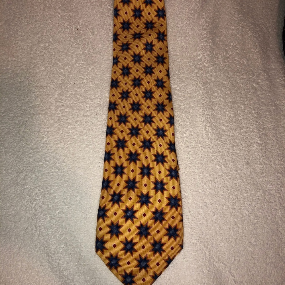 Burberry’s of London Men’s tie.